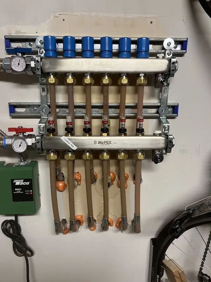 Plumber performing Water Heater Repair at a residential property in Estes Park